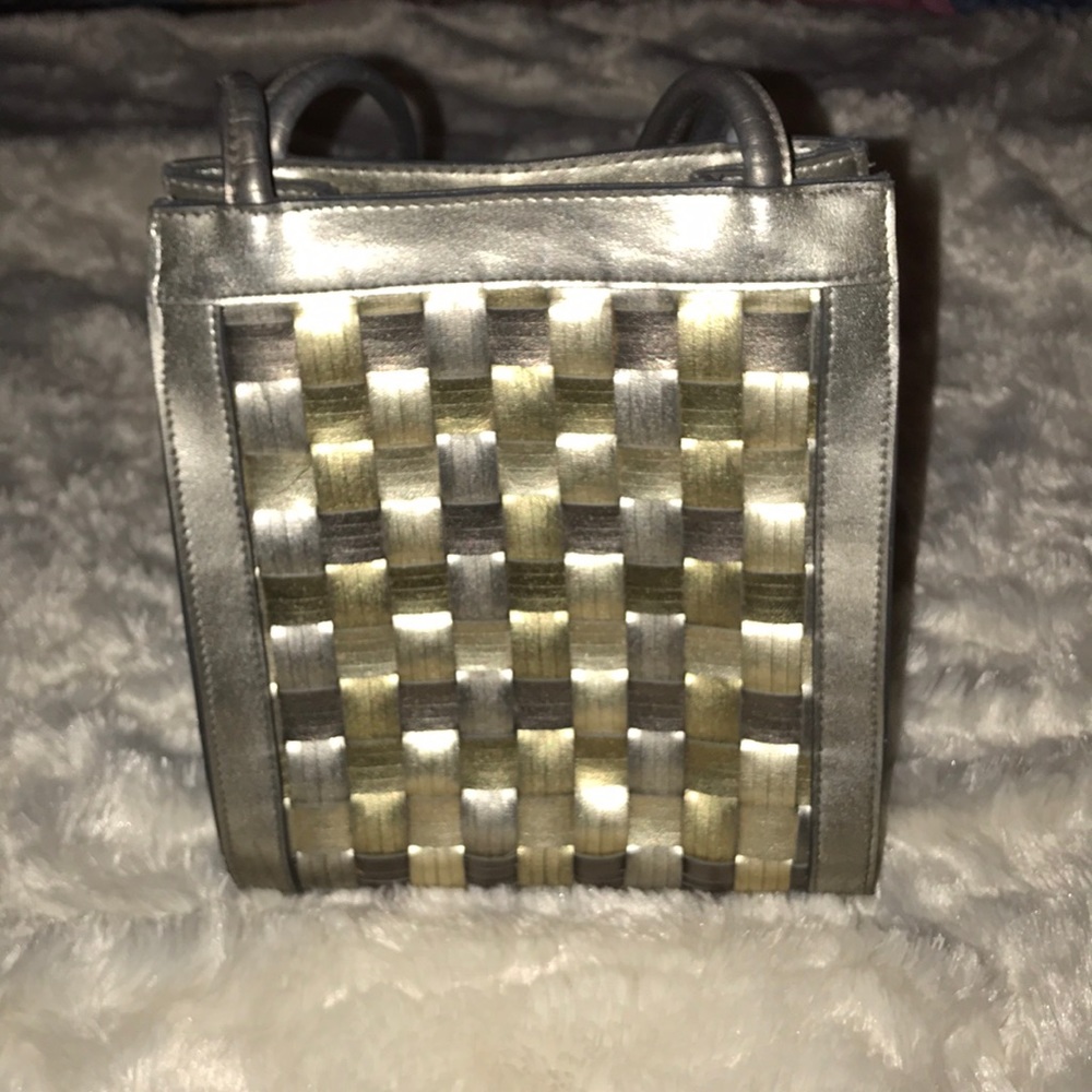 All leather metallic gold handbag.